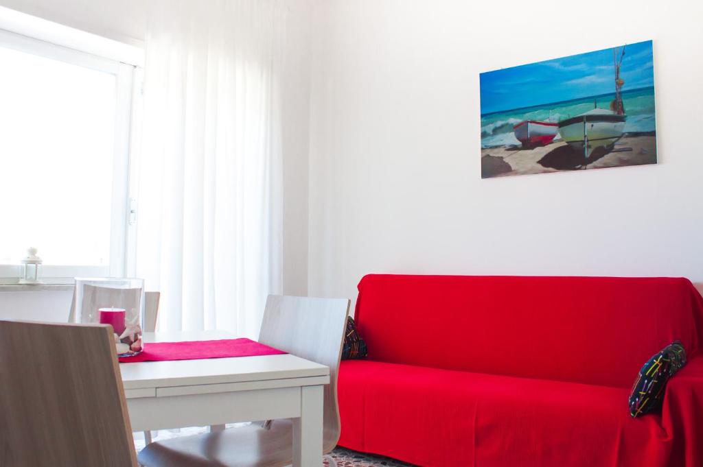 A seating area at Case Vacanze Ganimede