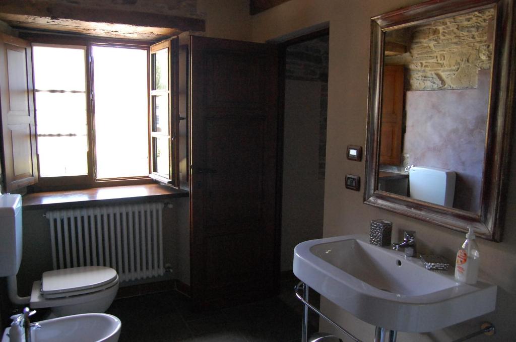 Kúpeľňa v ubytovaní Appartamenti Cenni - Relais su Lago
