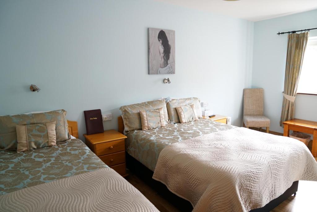 Postel nebo postele na pokoji v ubytování The Gap Lodge B&B