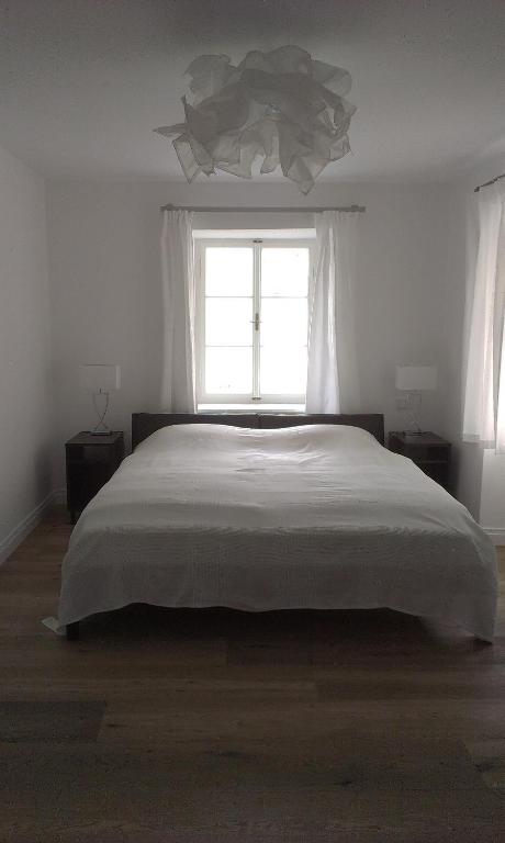 A bed or beds in a room at Villa Bertholini