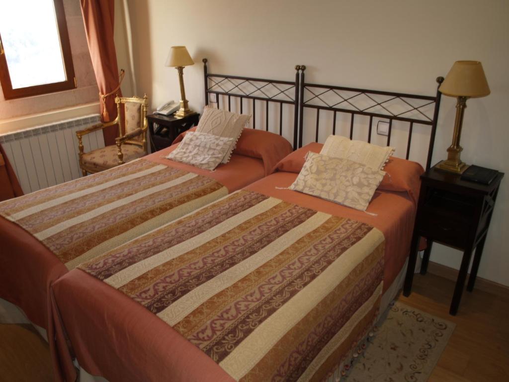 Cama o camas de una habitación en Residencia Real del Castillo de Curiel