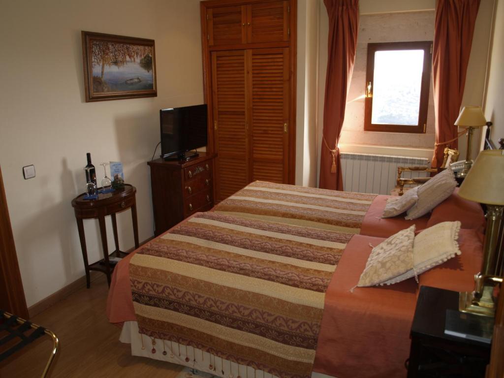 Cama o camas de una habitación en Residencia Real del Castillo de Curiel