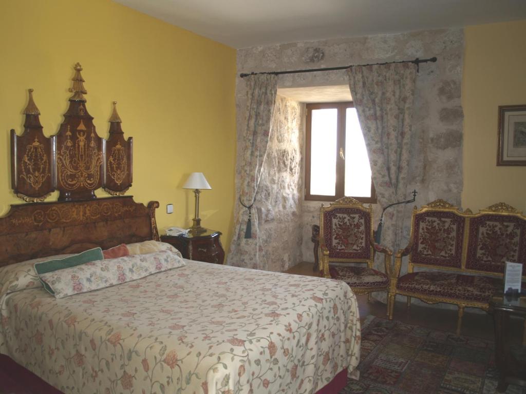 Cama o camas de una habitación en Residencia Real del Castillo de Curiel