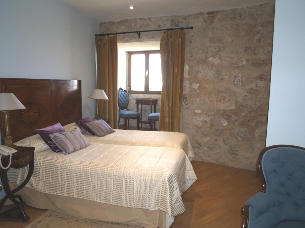Cama o camas de una habitación en Residencia Real del Castillo de Curiel