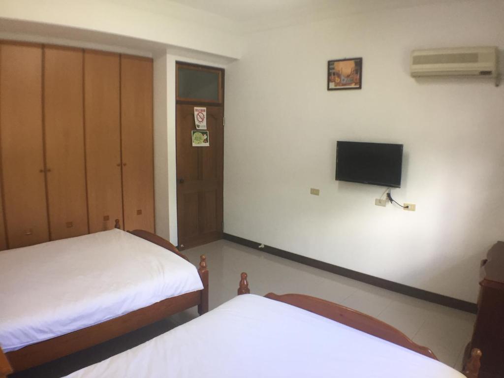 Katil atau katil-katil dalam bilik di Yuan Gong Yuan