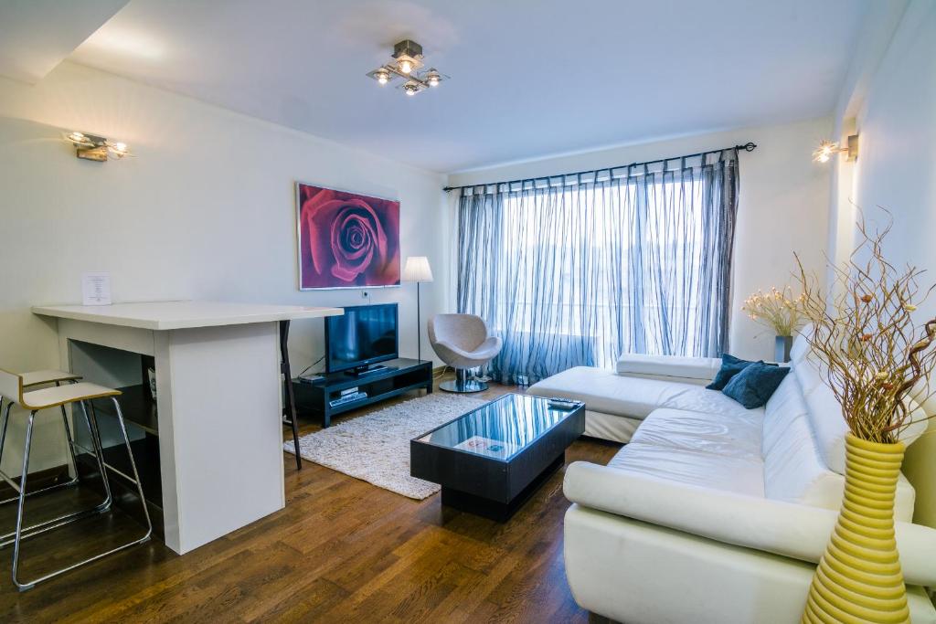 Posedenie v ubytovaní Luxury Downtown Apartments