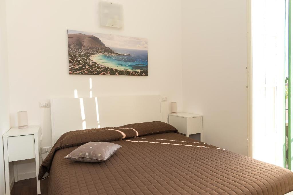 Postel nebo postele na pokoji v ubytování Ai Lattarini House