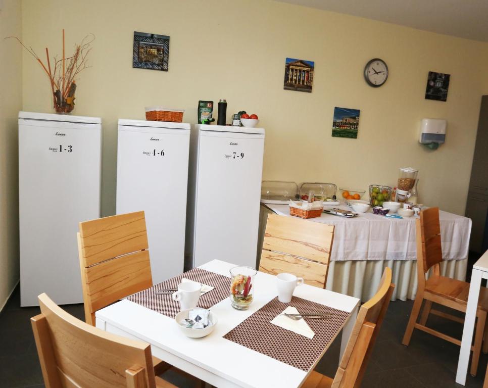Kuchyň nebo kuchyňský kout v ubytování Hotel Schillerquartier
