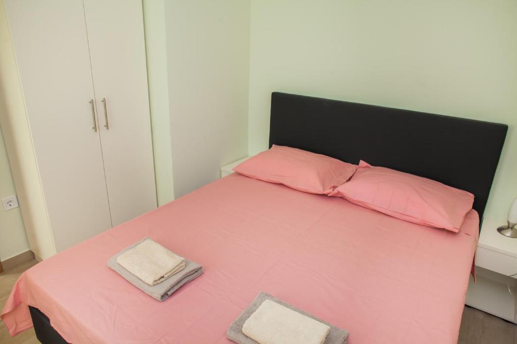 Postel nebo postele na pokoji v ubytování Apartments Villa Matea