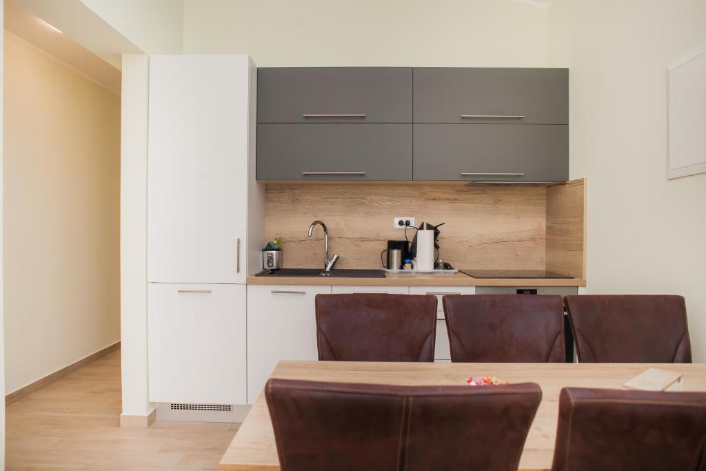 Kuchyň nebo kuchyňský kout v ubytování Apartments Villa Matea