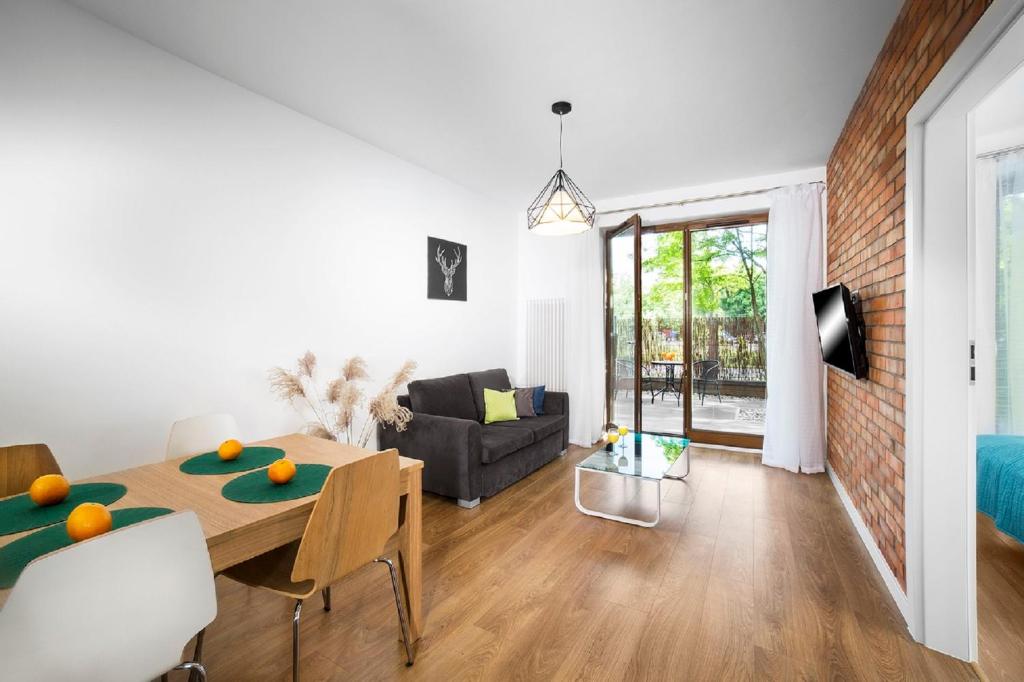 Posedenie v ubytovaní Apartamenty Pomarańczarnia