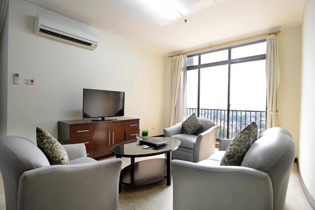 TV a/nebo společenská místnost v ubytování Midtown Residence Simatupang Jakarta