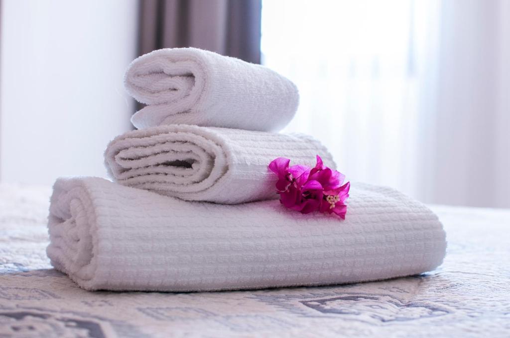 Postel nebo postele na pokoji v ubytování Hotel Maria