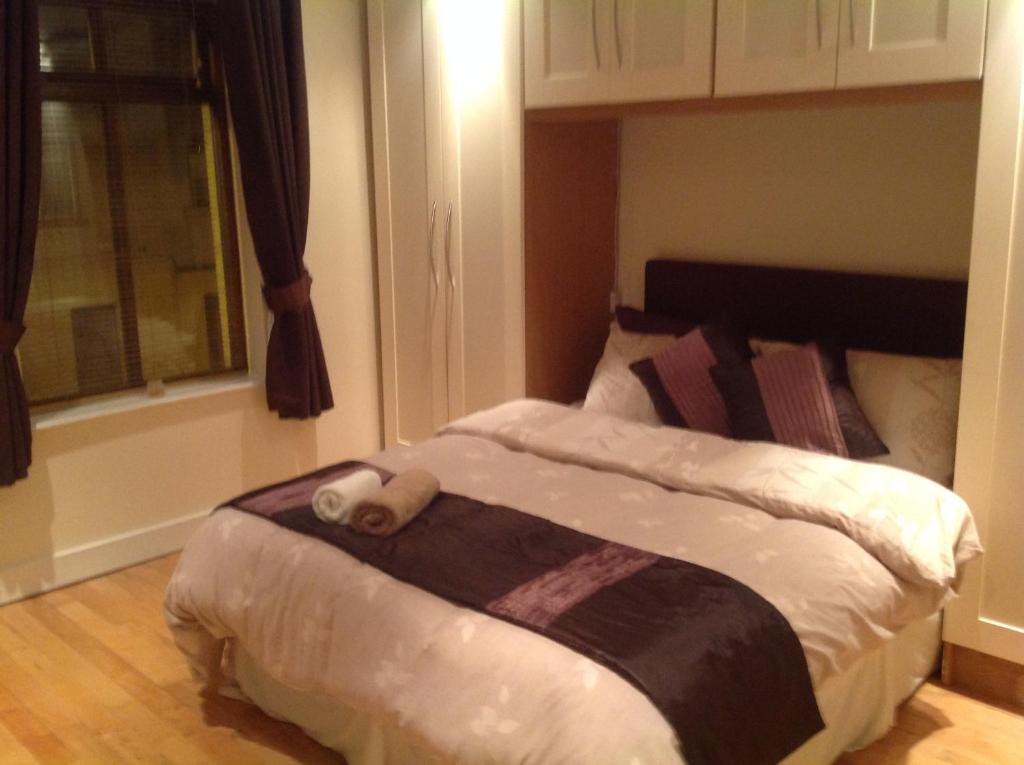 Cama ou camas em um quarto em Harbour View Apartment
