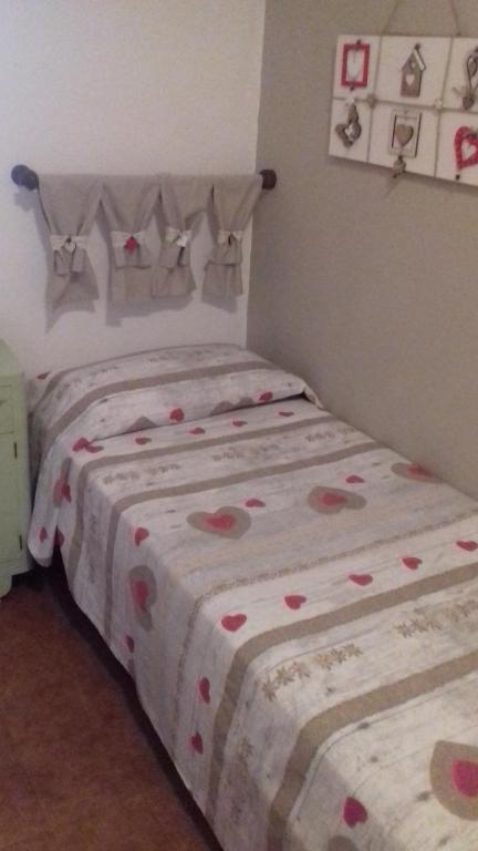 Postel nebo postele na pokoji v ubytování Agriturismo La Carlina