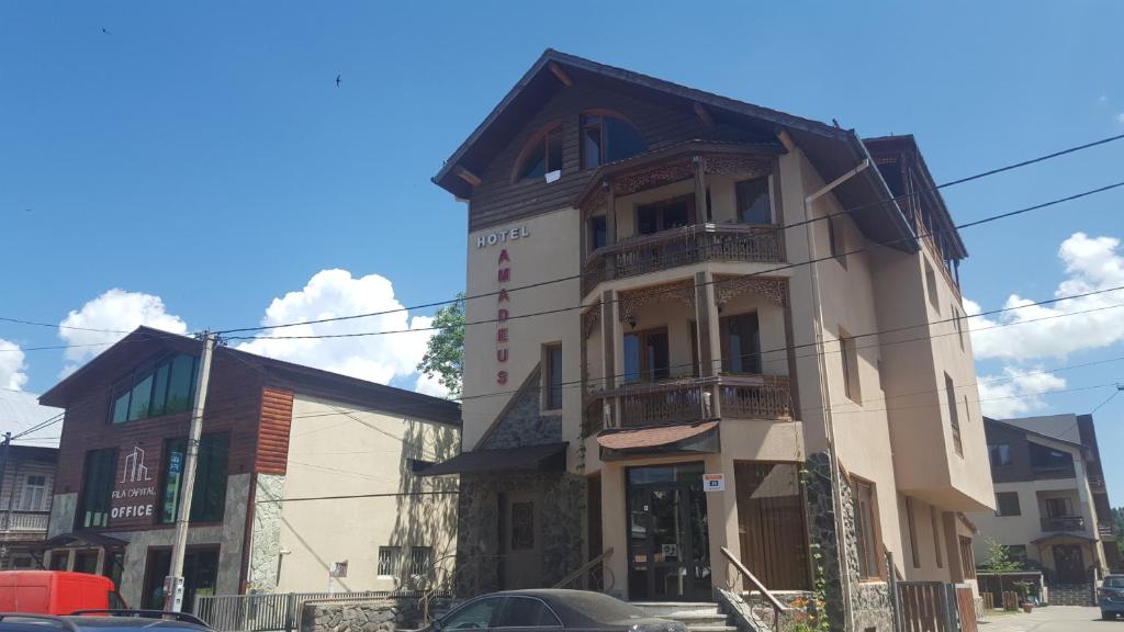 a building on the corner of a street at Amadeus in Bakuriani