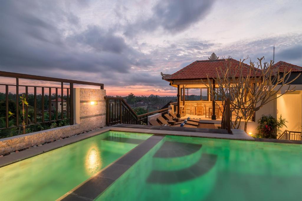 Bazén v ubytování Pecatu Ubud Guest House nebo v jeho okolí