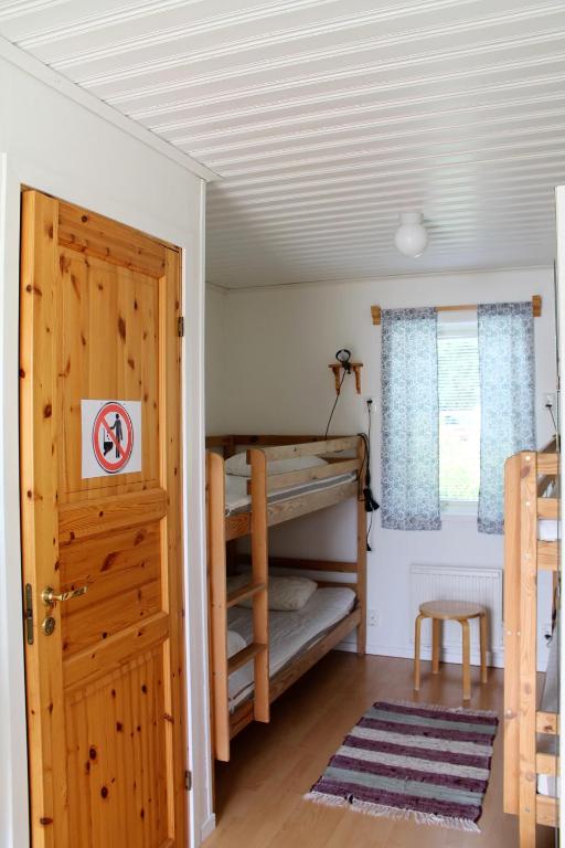 Postel nebo postele na pokoji v ubytování Trosa Vandrarhem