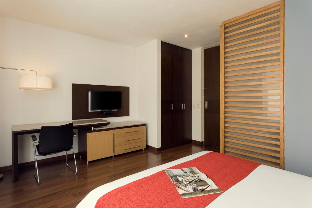 TV a/nebo společenská místnost v ubytování Mercure Bogota BH Retiro