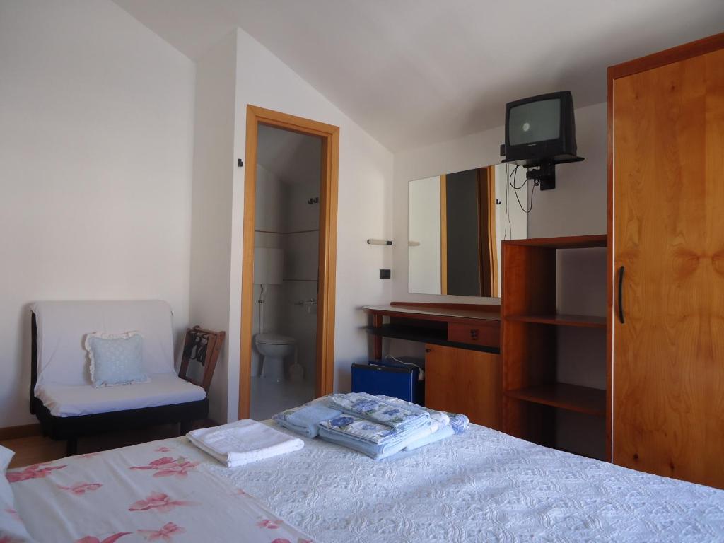 Postel nebo postele na pokoji v ubytování Hotel L&V