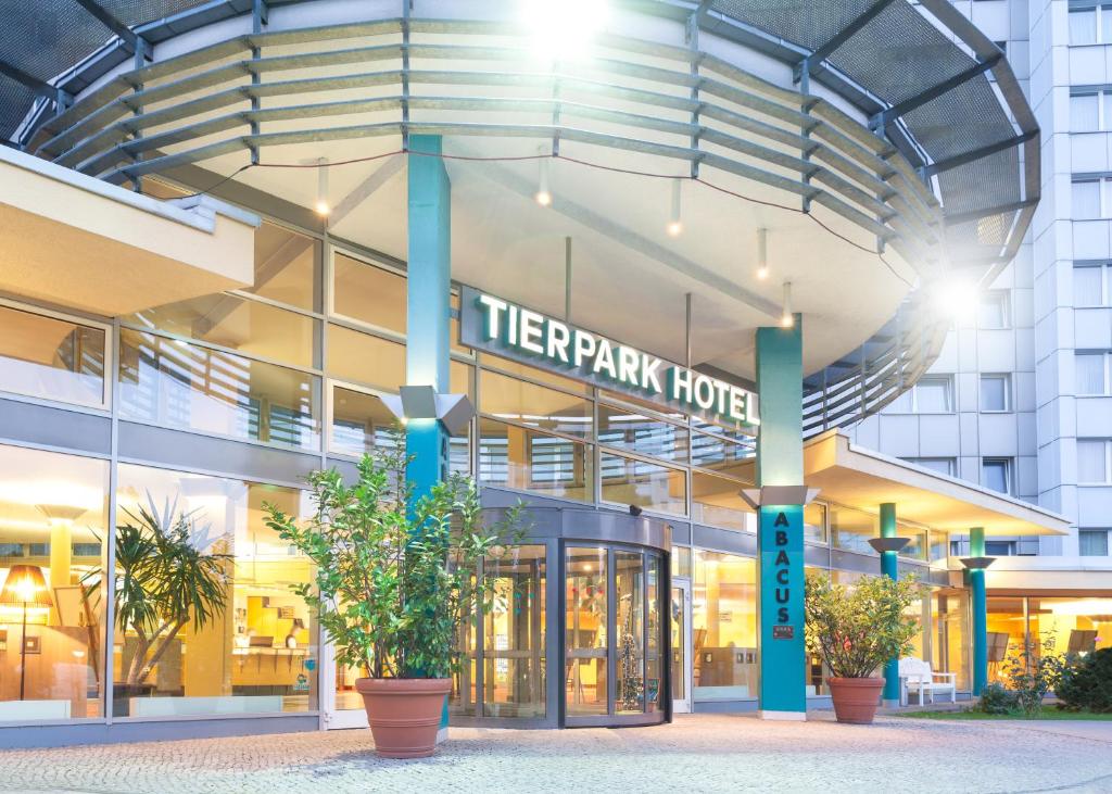 a hotel building with a sign that reads theirark hotel at ABACUS Tierpark Hotel in Berlin