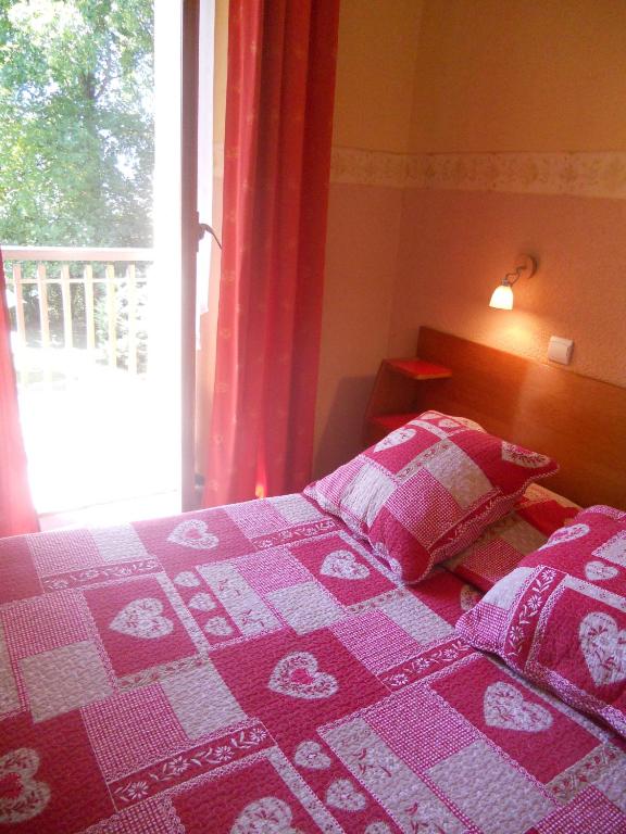 Postel nebo postele na pokoji v ubytování Hotel Bellevue