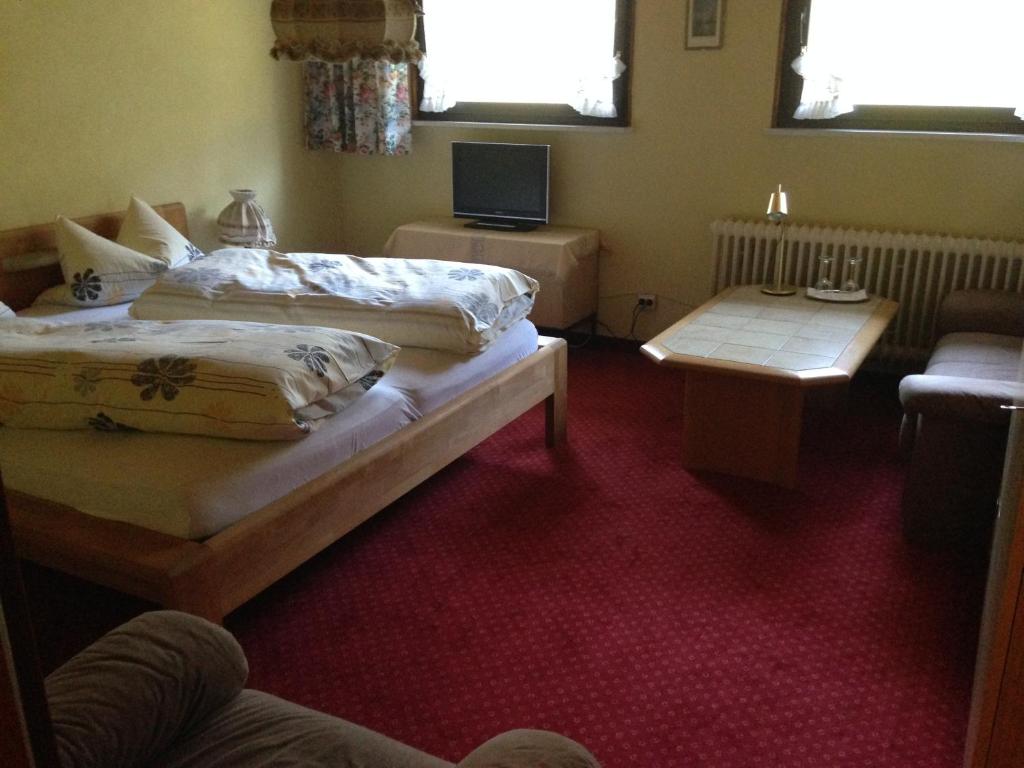 Postel nebo postele na pokoji v ubytování Café - Pension Bernreutehof