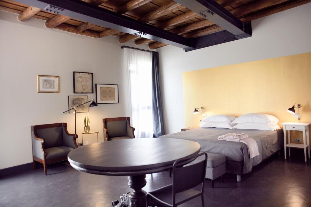 Postel nebo postele na pokoji v ubytování Pepita Lodge