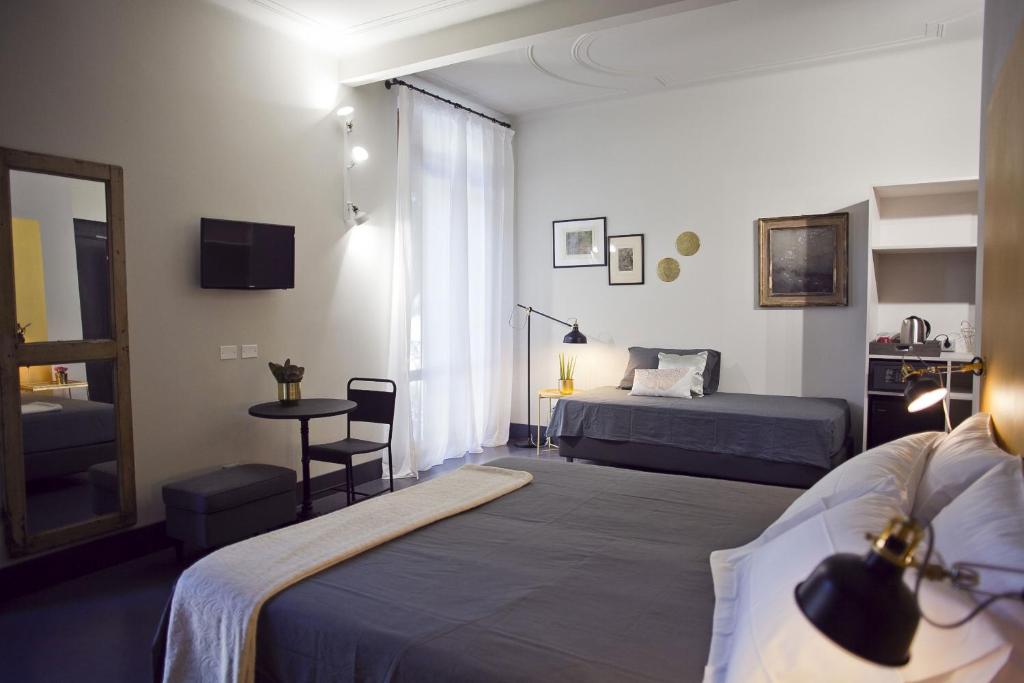 Postel nebo postele na pokoji v ubytování Pepita Lodge