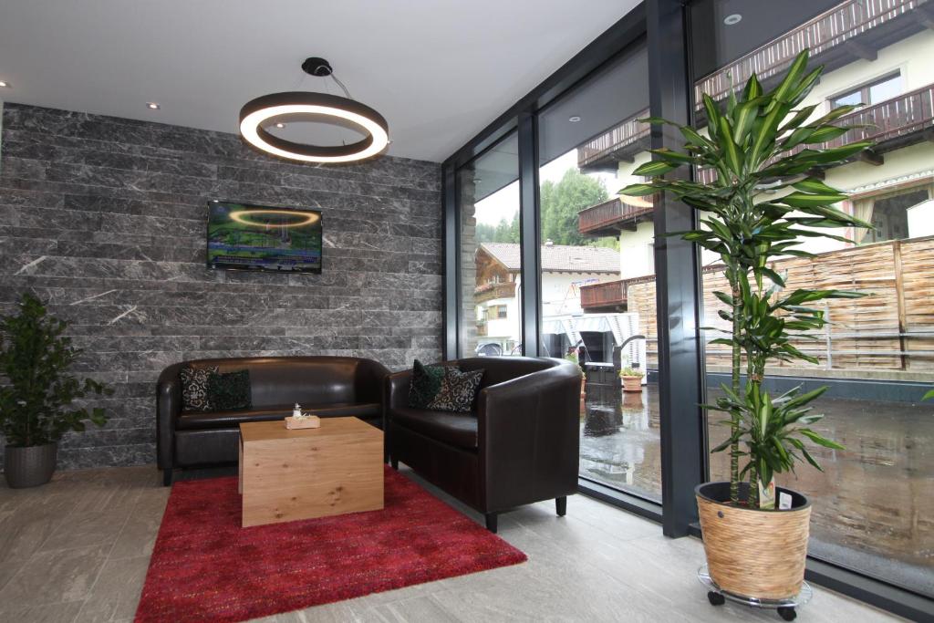 Posezení v ubytování Hotel Bärolina