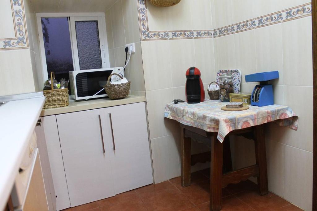 Kuchyň nebo kuchyňský kout v ubytování La casita de la ciudad