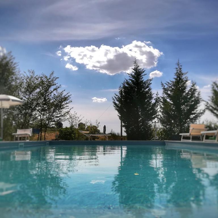 The swimming pool at or close to Certine Agriturismo