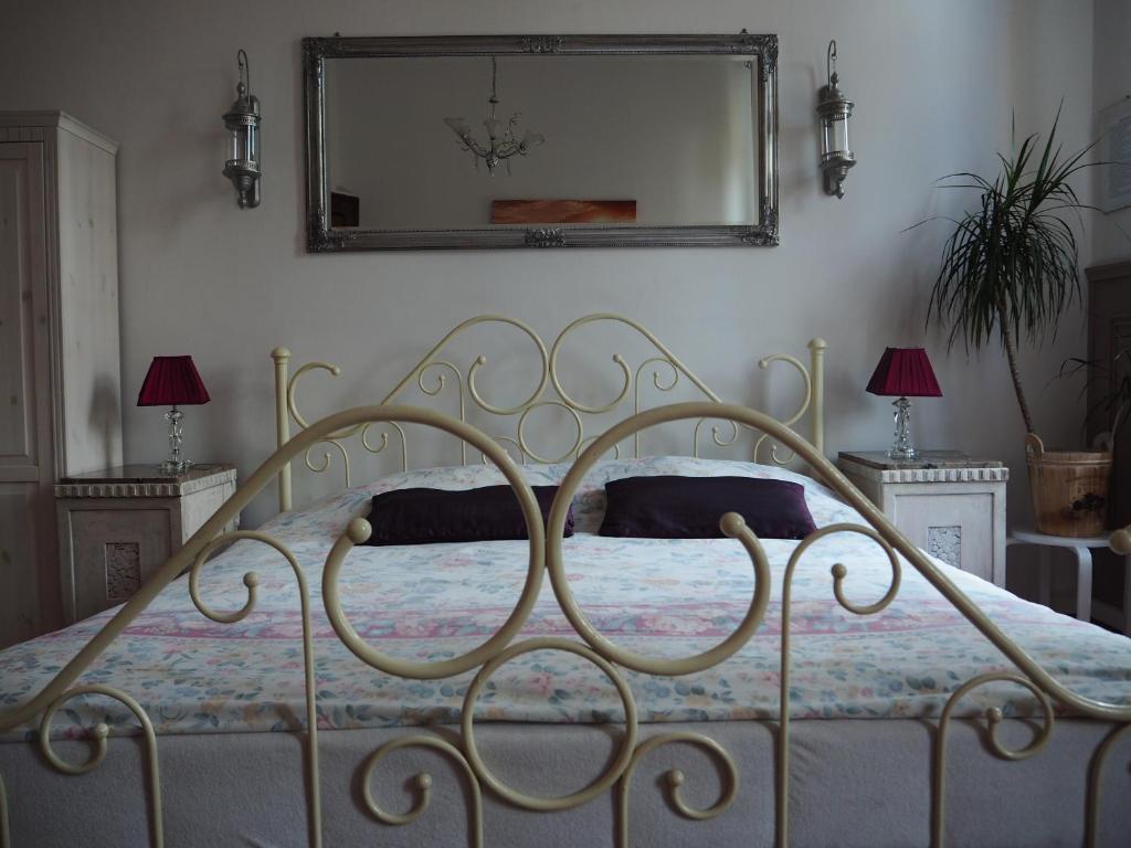 Ένα ή περισσότερα κρεβάτια σε δωμάτιο στο Pokoje Gościnne P.O.W. 17