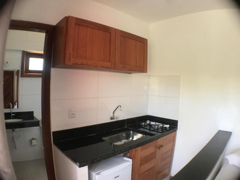 Kuchyň nebo kuchyňský kout v ubytování Arpoador Flat