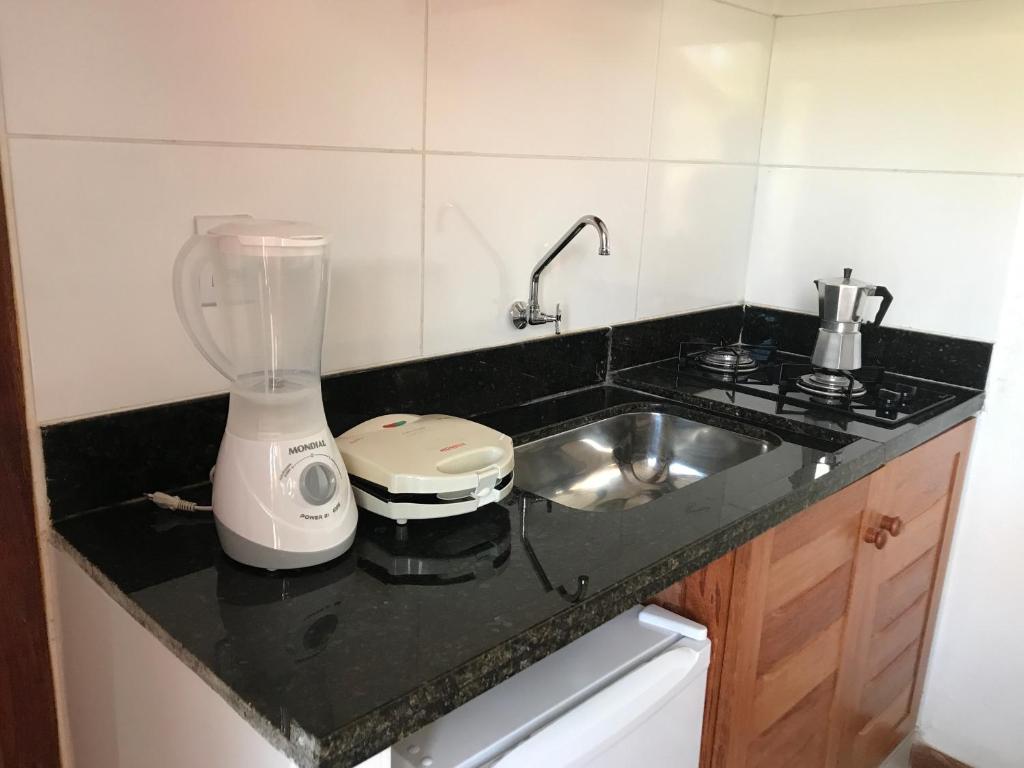 Kuchyň nebo kuchyňský kout v ubytování Arpoador Flat