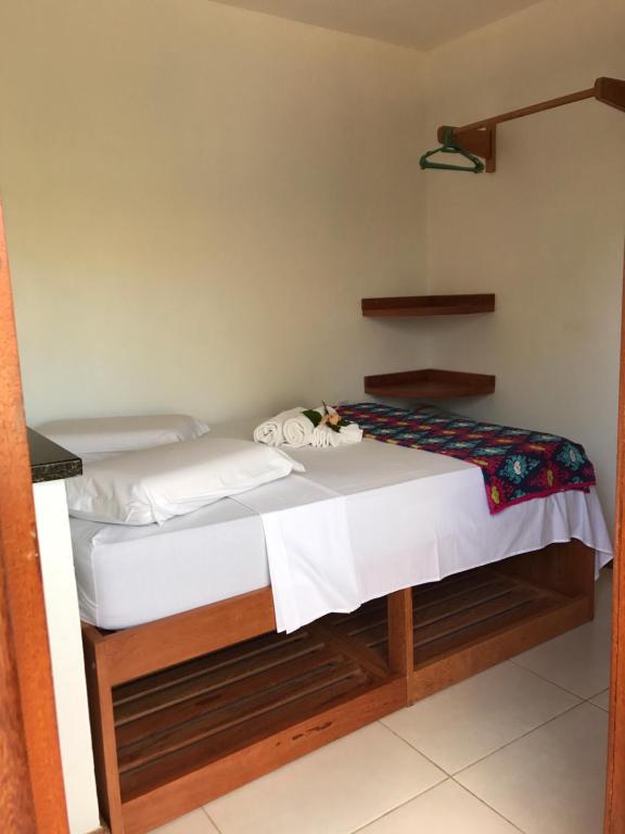 Postel nebo postele na pokoji v ubytování Arpoador Flat