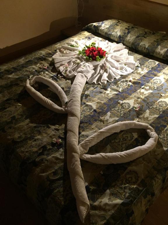 Postel nebo postele na pokoji v ubytování Hotel Concordia