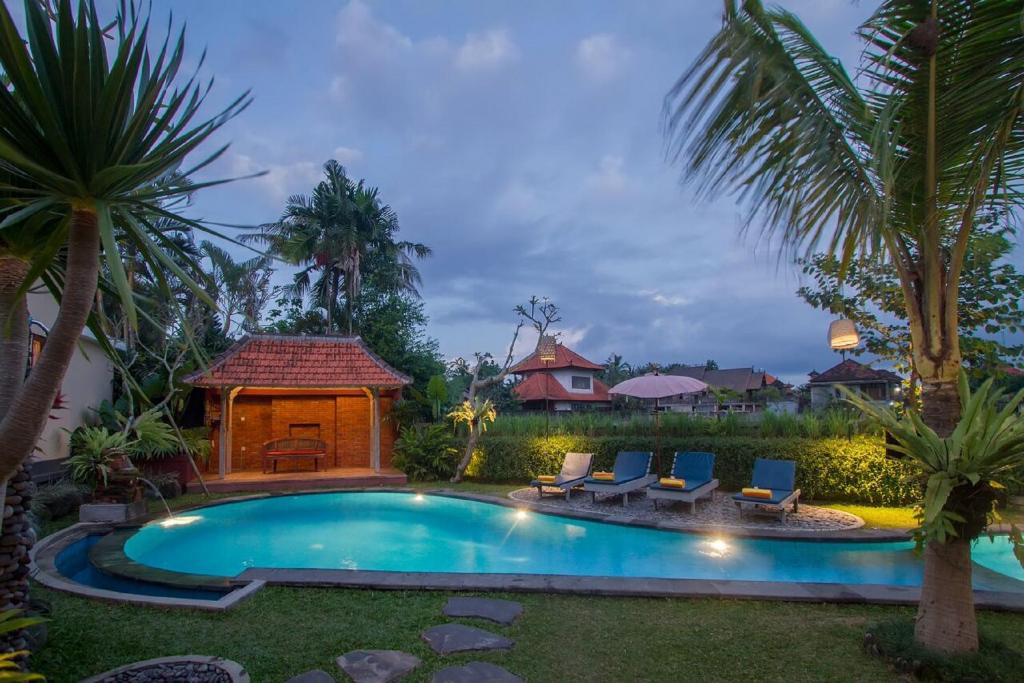 Bazén v ubytování Pondok Massas Ubud nebo v jeho okolí