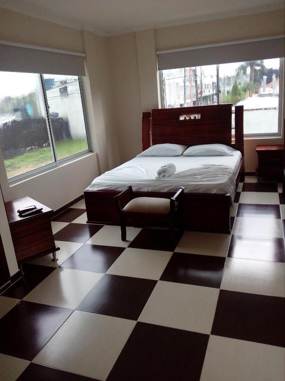 Postel nebo postele na pokoji v ubytování Hotel Prado Country