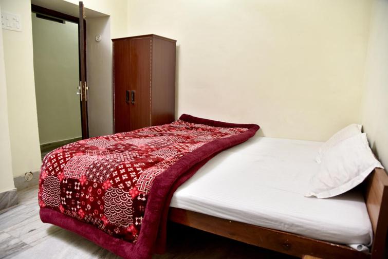Postel nebo postele na pokoji v ubytování Hotel Ram