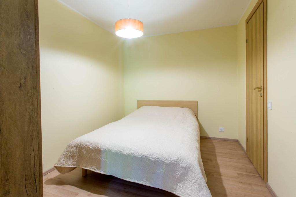 Postel nebo postele na pokoji v ubytování Pärnu Villa Harmony