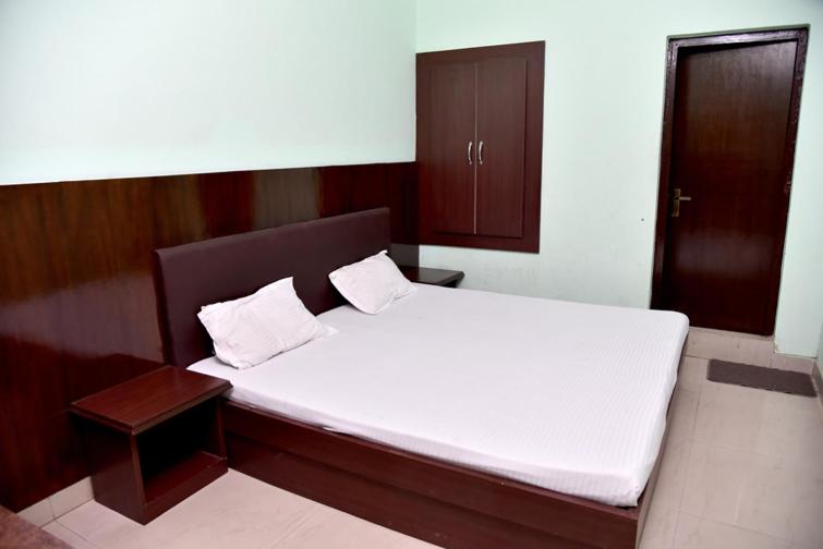 Postel nebo postele na pokoji v ubytování Hotel Ram