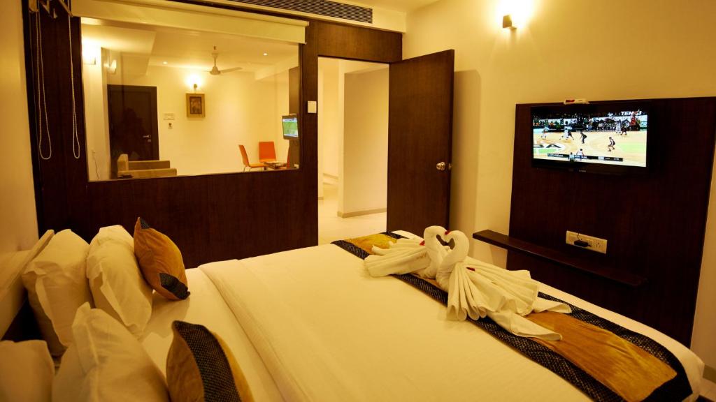 TV a/nebo společenská místnost v ubytování Hotel Golden View