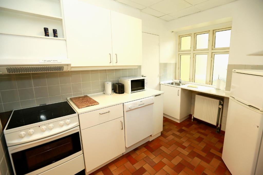 Kuchyň nebo kuchyňský kout v ubytování Hotel 9 små hjem