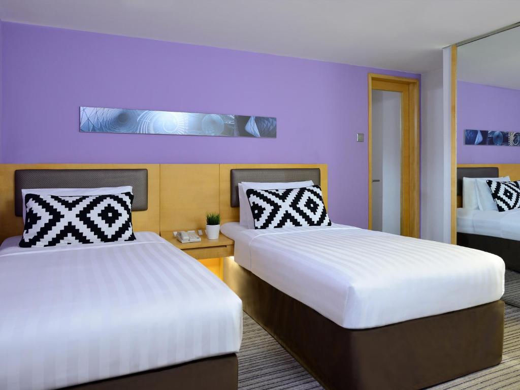 Postel nebo postele na pokoji v ubytování Kew Green Hotel Wanchai Hong Kong