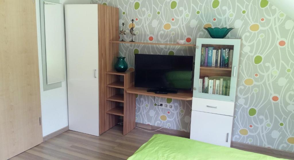 Postel nebo postele na pokoji v ubytování Pension Hainbuch