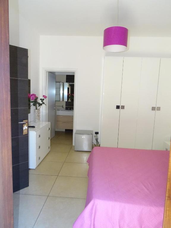 Łóżko lub łóżka w pokoju w obiekcie B&B Soleluna