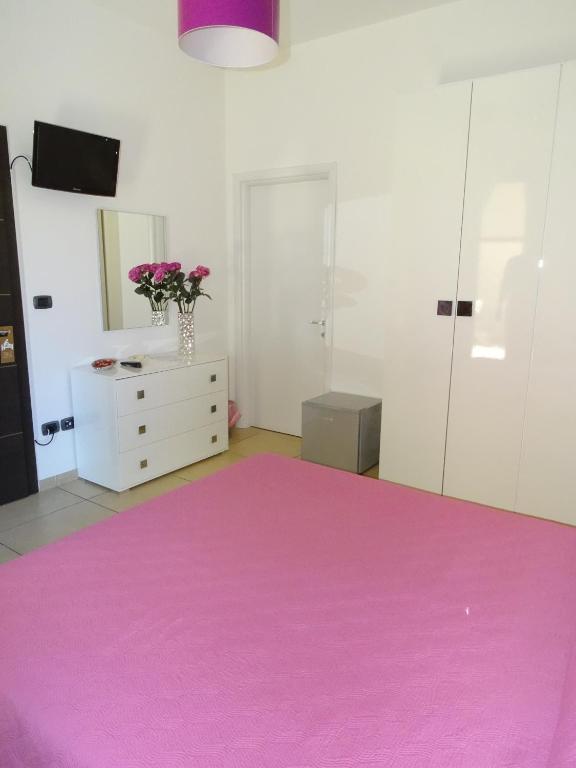 Łóżko lub łóżka w pokoju w obiekcie B&B Soleluna