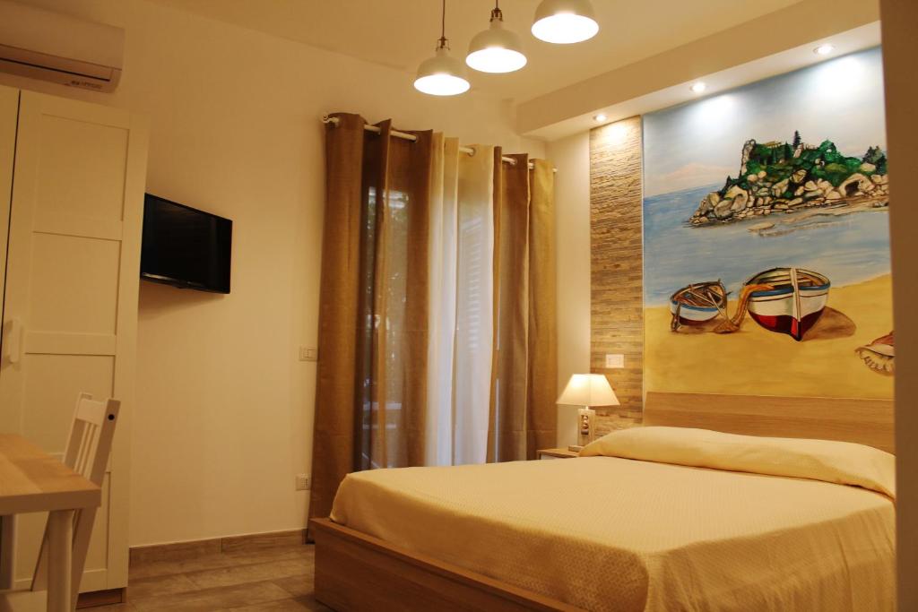 Televízia a/alebo spoločenská miestnosť v ubytovaní B&B My Sicily