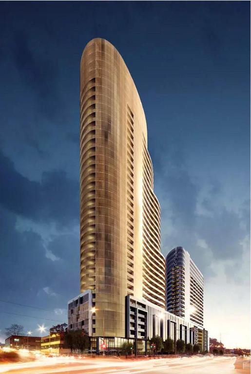 a rendering of a tall building in a city at Whitehorse Towers Self Service Holiday Apartment in Box Hill